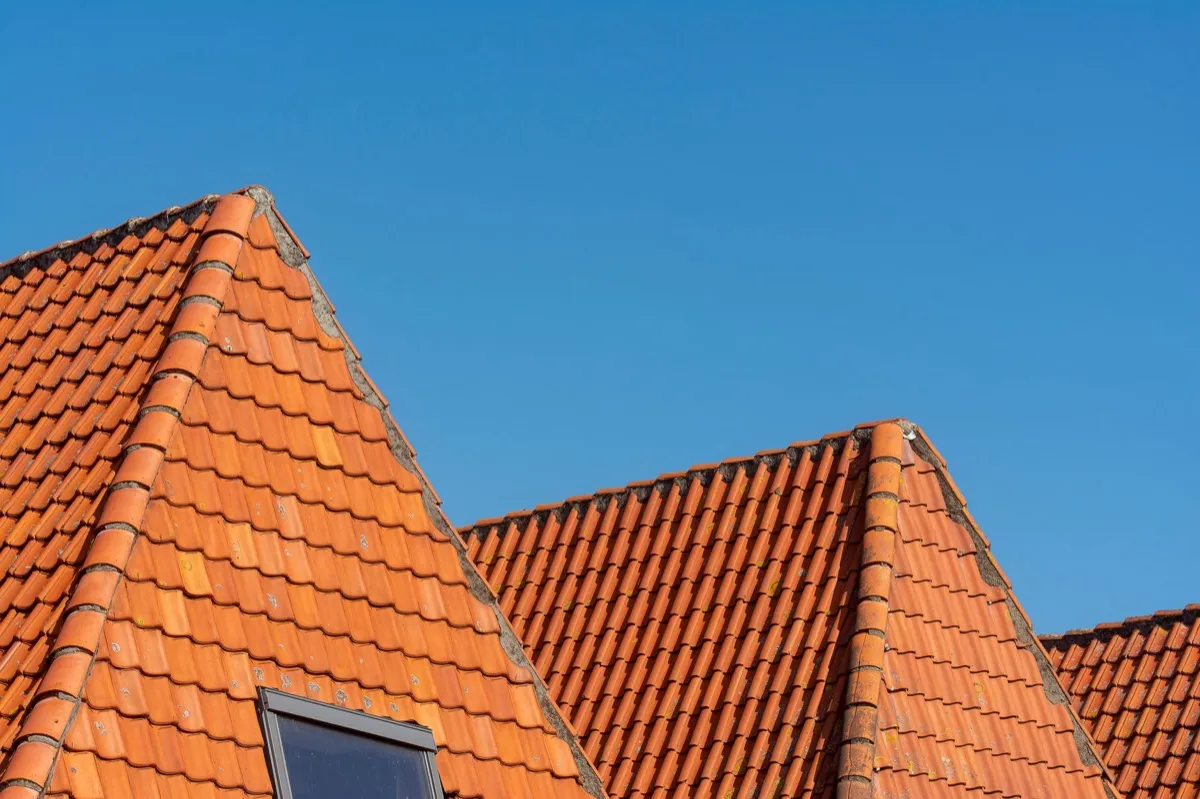 Clay barrel tile rooflines on homes in Menifee, CA